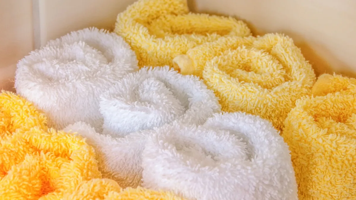 Clean rolled towels ready for blotting a fresh pet accident